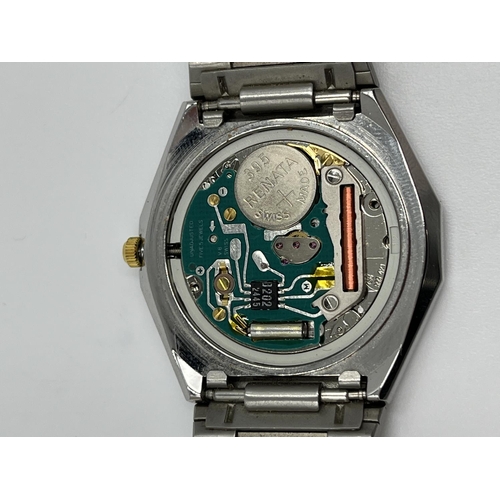 1378 - A cased Favre-Leuba Genève quartz 34mm wristwatch - ref. 5900-53 with warranty card