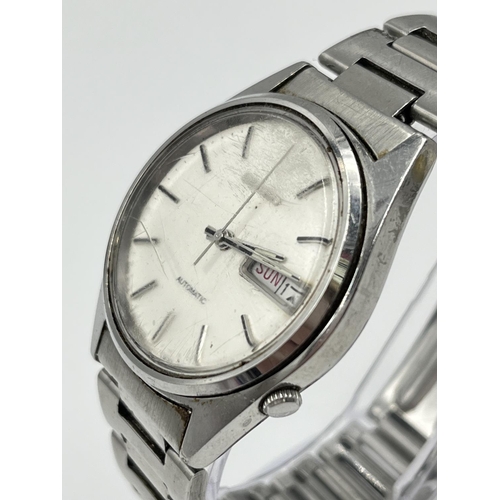 1386 - A Seiko automatic day date 35mm men's wristwatch - ref. 6309-7150