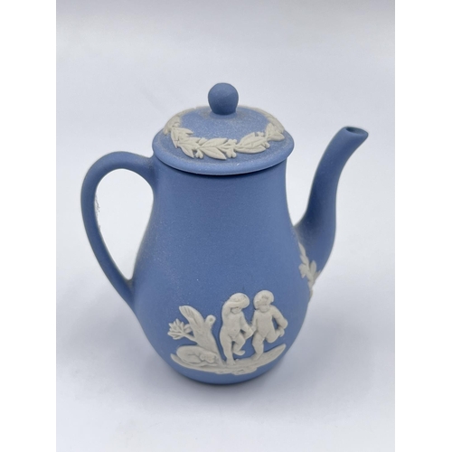 1326 - A Wedgwood pale blue Jasperware five piece miniature tea and coffee set