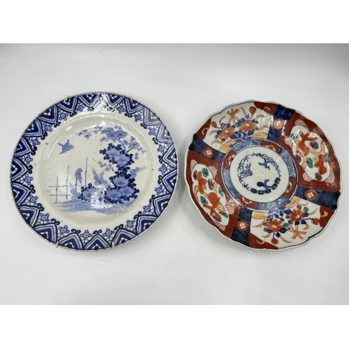 1329 - Two 19th century oriental porcelain plates, blue and white approx. 22cm diameter and one Imari appro... 