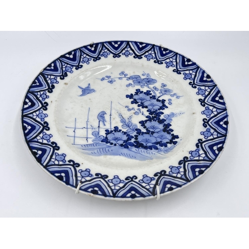 1329 - Two 19th century oriental porcelain plates, blue and white approx. 22cm diameter and one Imari appro... 