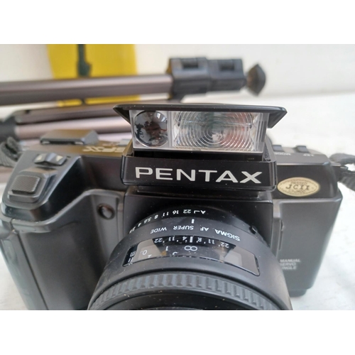 443 - Two items, one Miranda camera case containing Pentax SFX auto focus 35mm SLR camera fitted with Sigm... 