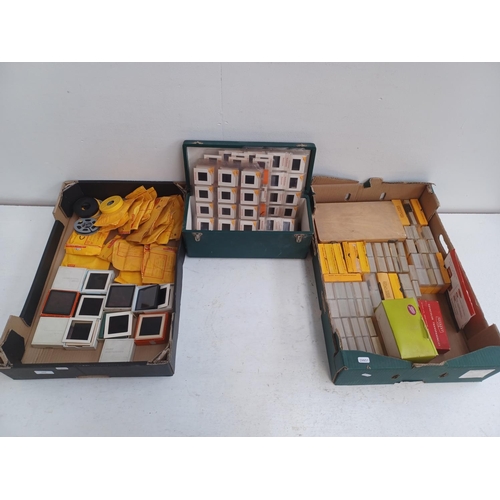 444 - Three boxes containing, boxed Boots 4000 TL slide viewer, large collection of slides, boxed colour t... 