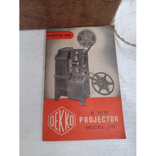 448 - A boxed Dekko Cameras Ltd. model 118 8mm projector with instruction manual