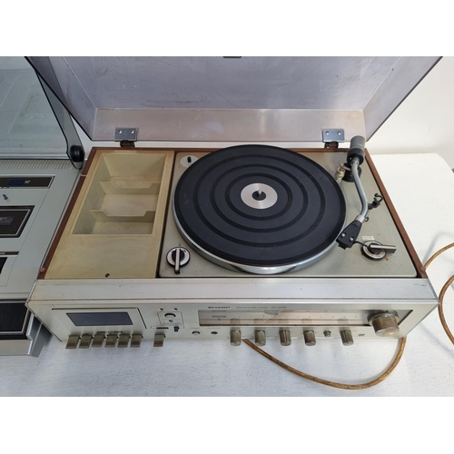 451 - Two vintage stereo music centres, one Sharp SG-220E comprising two speed turntable, cassette deck an... 