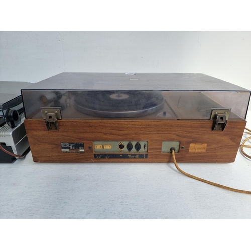 451 - Two vintage stereo music centres, one Sharp SG-220E comprising two speed turntable, cassette deck an... 