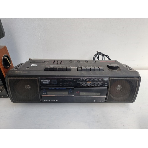 453 - Four portable audio items, one Vega Selena B212 eight band radio, one Ultra three band radio with ca... 