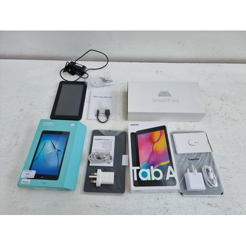 523 - Three boxed tablets, one Huawei MediaPad T3 16GB ROM 2GB RAM, one Samsung Tab A 2GB RAM 32GB ROM and... 