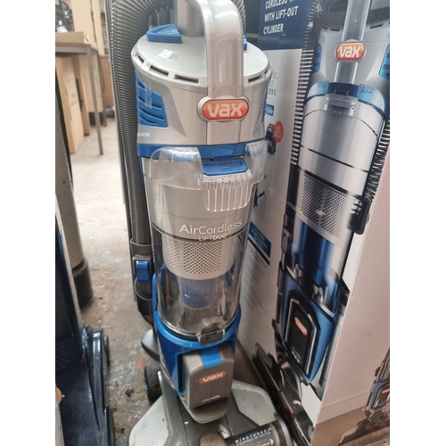 584 - A Vax Air cordless Lift Duo upright bagless vacuum cleaner with boxed accessories