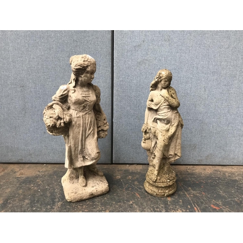 675 - Two cast stone lady garden statues - largest approx. 74cm high