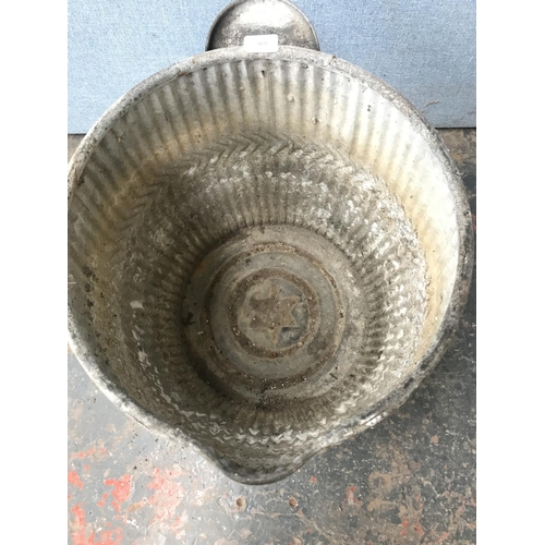 678 - A vintage galvanised dolly tub - approx. 53cm high x 43cm diameter