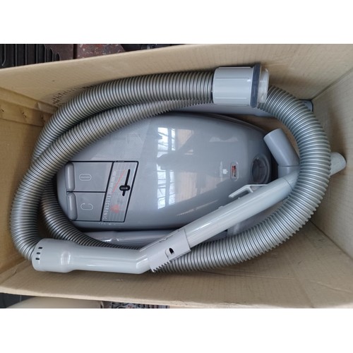 581 - Two cleaners with attachments, one boxed Electrolux Lite vacuum and one Shark floor and handheld ste... 