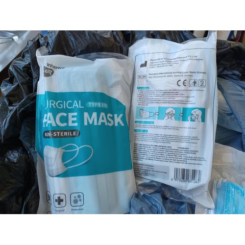 673 - Two bags containing a large quantity of 3 ply surgical masks