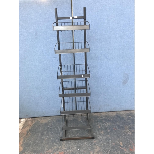 687 - A metal six tier shop display rack - approx. 168cm high x 46cm wide x 43cm deep