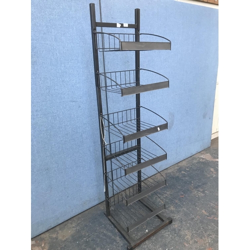 687 - A metal six tier shop display rack - approx. 168cm high x 46cm wide x 43cm deep