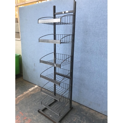 687 - A metal six tier shop display rack - approx. 168cm high x 46cm wide x 43cm deep