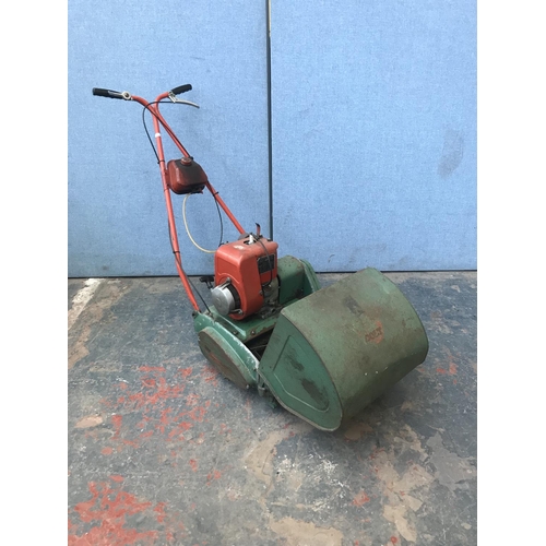 688 - A vintage Suffolk SuperColt petrol lawn mower