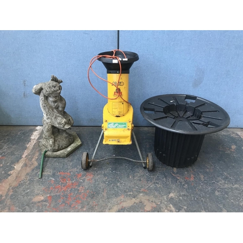 690 - Two garden items, one Al-Ko H1600DS 240v chipper and one cast stone statue water feature with cast s... 