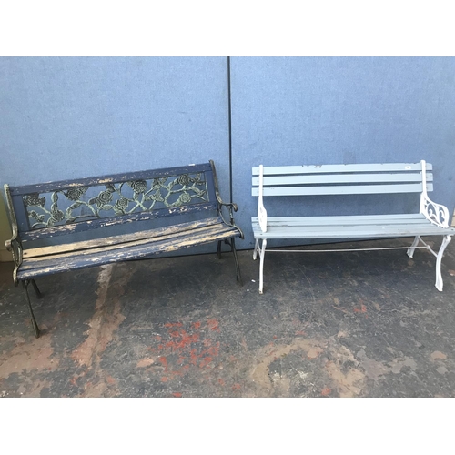 692 - Two cast metal and wooden slatted garden benches