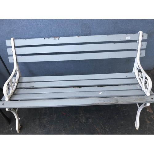 692 - Two cast metal and wooden slatted garden benches