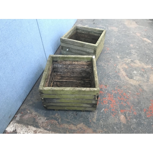 694 - Two weathered pine square garden planters - approx. 33cm high x 50cm square