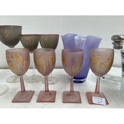 180A - A collection of studio glass to include four Simron hand painted 16cm wine glasses, John Lewis purpl... 