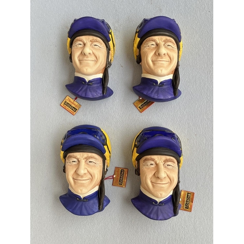 66 - Four boxed Bossons Jockey hand painted chalkware head wall plaques
