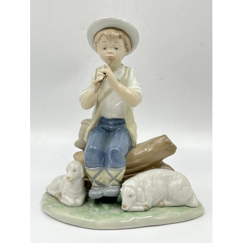 10 - Three Nao by Lladro porcelain figurines - largest approx. 17cm high