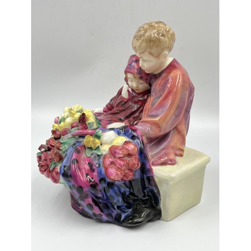 14 - A Royal Doulton 'Flower Sellers Children' figurine - HN 1342