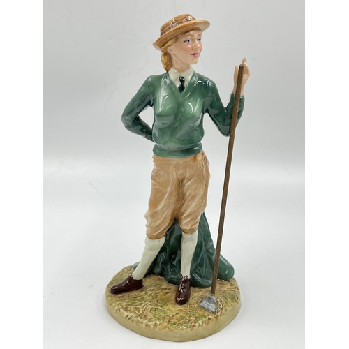 22 - Three Royal Doulton figurines comprising Women's Land Army limited edition no. 45 of 2,500 by Timoth... 