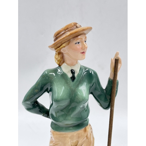 22 - Three Royal Doulton figurines comprising Women's Land Army limited edition no. 45 of 2,500 by Timoth... 