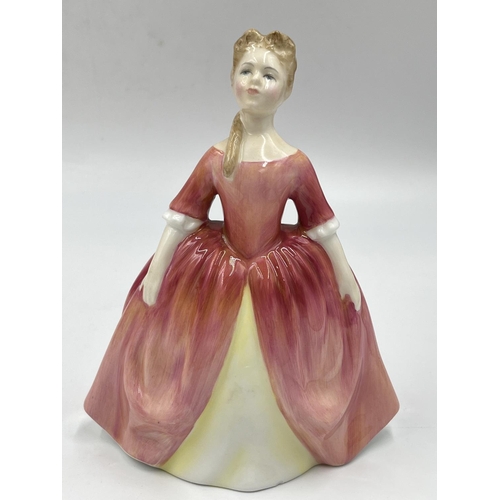 23 - Four Royal Doulton figurines comprising Top O' The Hill HN 1834, Fair Maiden HN 2211, Sophie HN 2833... 