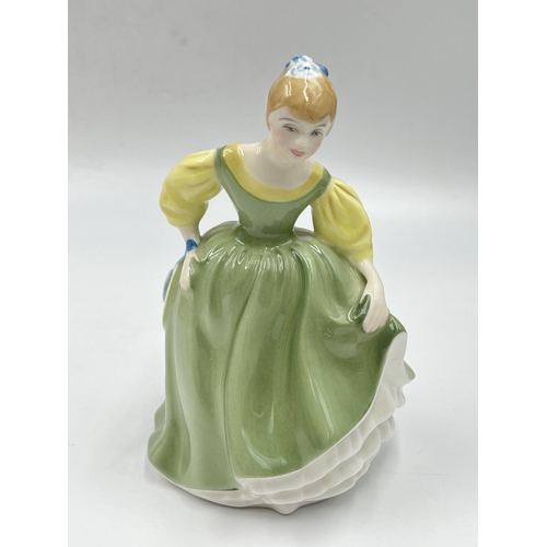 23 - Four Royal Doulton figurines comprising Top O' The Hill HN 1834, Fair Maiden HN 2211, Sophie HN 2833... 