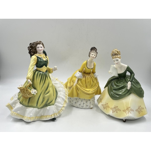 25 - Three Royal Doulton figurines comprising April HN 3693, Soiree HN 2312 and Coralie HN 2307