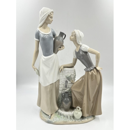 26 - A Nao by Lladro Ladies At The Well figurine, model no. 178 - approx. 39.5cm high