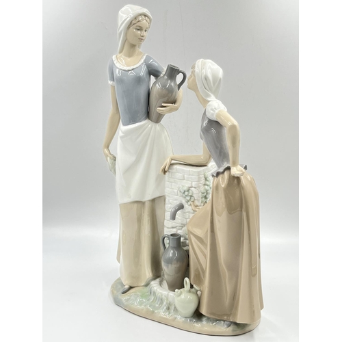 26 - A Nao by Lladro Ladies At The Well figurine, model no. 178 - approx. 39.5cm high