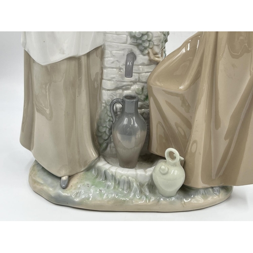 26 - A Nao by Lladro Ladies At The Well figurine, model no. 178 - approx. 39.5cm high