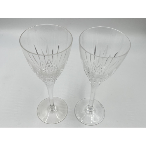28 - Three pieces of Stuart glassware, two 19cm glasses and one pedestal bonbon dish - approx. 15cm high ... 