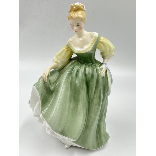 29 - Three Royal Doulton figurines comprising Dianna HN 3266, The Bridesmaid HN 2196 and Fair Lady HN 219... 