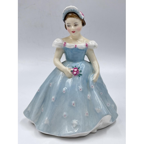 29 - Three Royal Doulton figurines comprising Dianna HN 3266, The Bridesmaid HN 2196 and Fair Lady HN 219... 