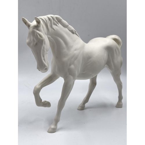 3 - Three ceramic horse figurines, Beswick Palomino, Royal Doulton Spirit of Freedom white matte and Bes... 