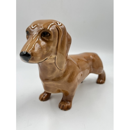 5 - A Beswick Dachshund figurine - approx. 14cm high x 22cm long