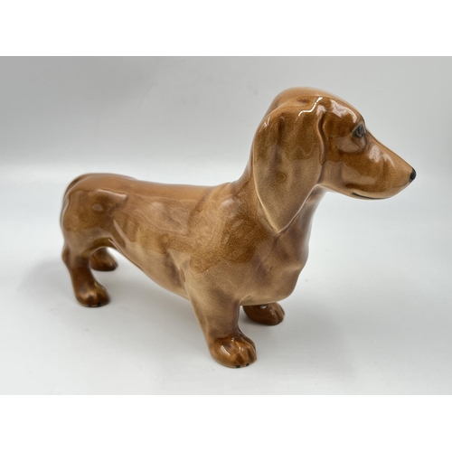 5 - A Beswick Dachshund figurine - approx. 14cm high x 22cm long