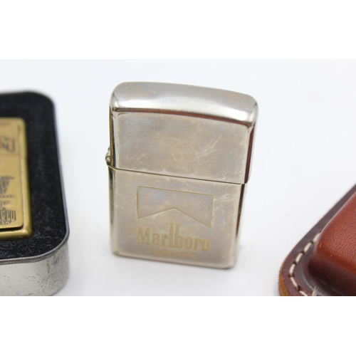 1338 - Two Zippo advertising cigarette lighters, one Jim Beam and one Marlboro