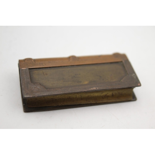 1339 - An antique brass novelty book petrol cigarette lighter with folding case - approx. 6cm x 3cm