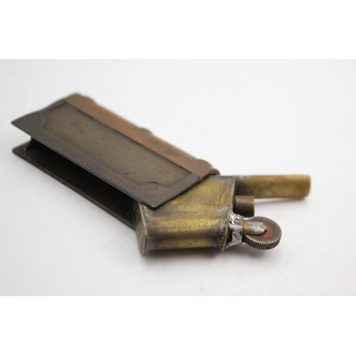 1339 - An antique brass novelty book petrol cigarette lighter with folding case - approx. 6cm x 3cm