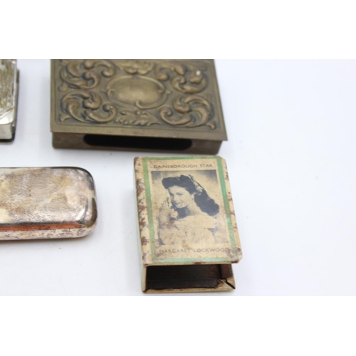 1344 - Eight antique smoking related items comprising one silver plated cigar holder, three vesta cases, tw... 