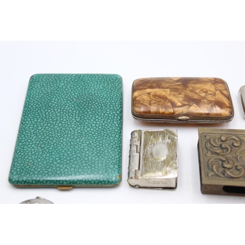 1344 - Eight antique smoking related items comprising one silver plated cigar holder, three vesta cases, tw... 