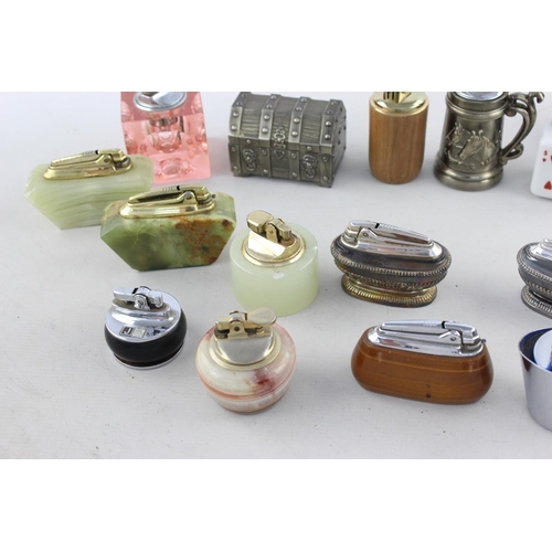 317 - Approx. twenty assorted vintage table lighters to include Ronson, Colibri etc.