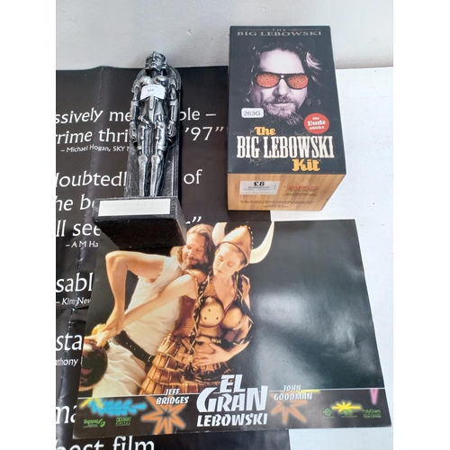 522 - Six items of movie memorabilia to include The Big Lebowski Kit, folded two sided L.A. Confidential p... 